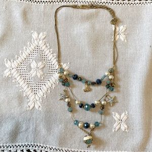 Betsey Johnson tiered coastal necklace.